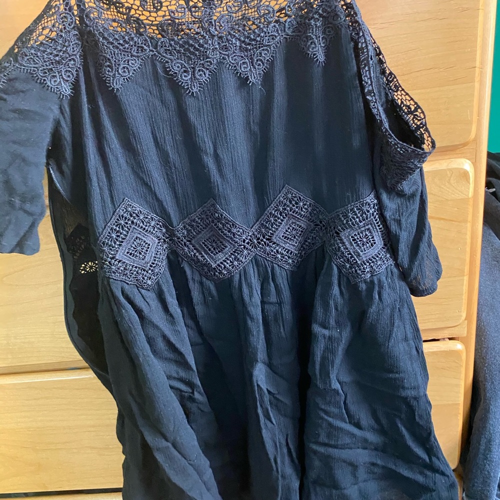 Super cute black romper with lace